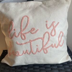White Pillow with Pink Embroidery